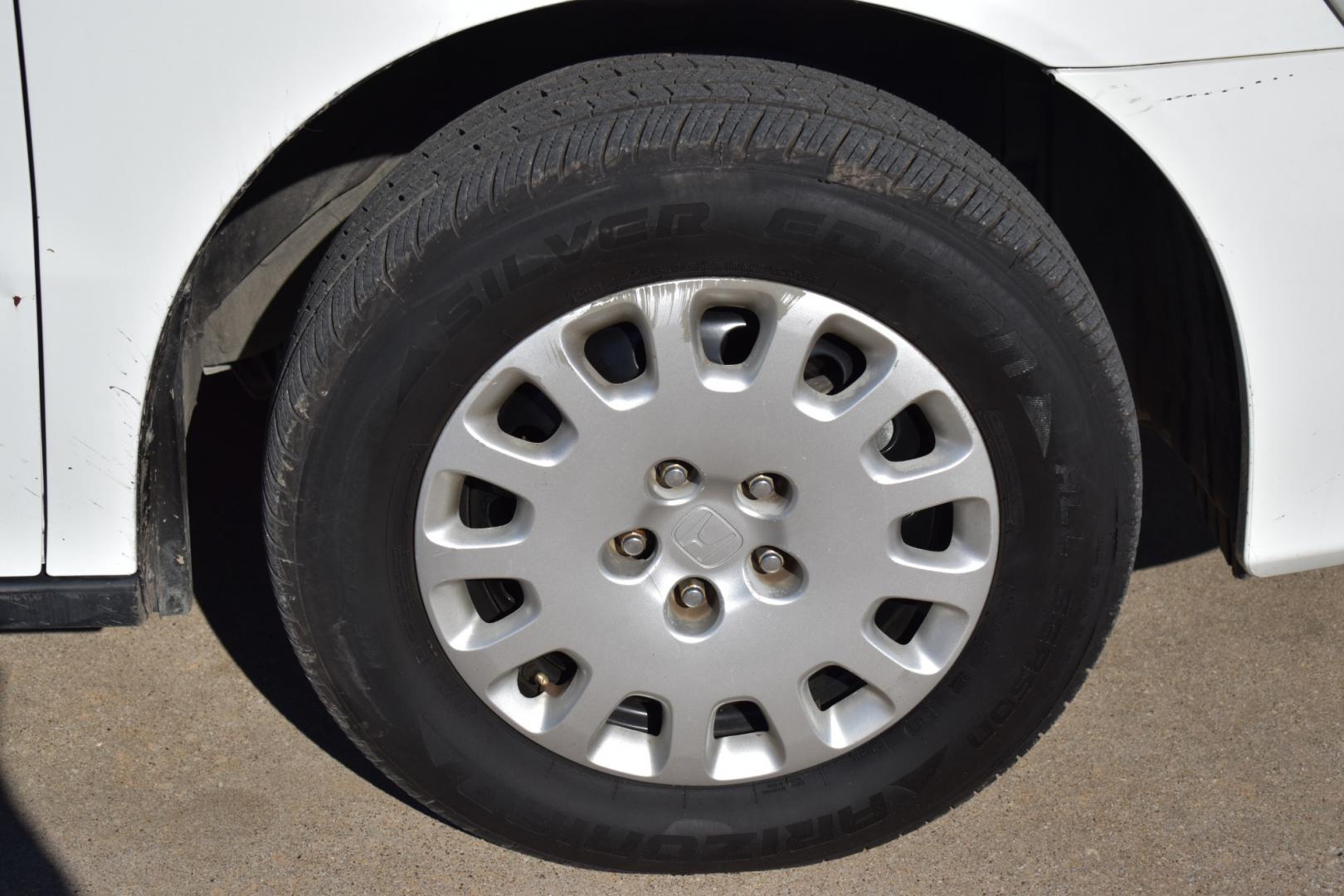 2003 White /Gray Honda Odyssey (5FNRL18513B) , located at 5925 E. BELKNAP ST., HALTOM CITY, TX, 76117, (817) 834-4222, 32.803799, -97.259003 - Buying a 2003 Honda Odyssey can be a smart choice for several reasons: Reliability: Hondas are known for their reliability, and the Odyssey is no exception. The 2003 model year is often praised for its durability and long-lasting performance. Safety: The 2003 Honda Odyssey comes equipped with safe - Photo#28